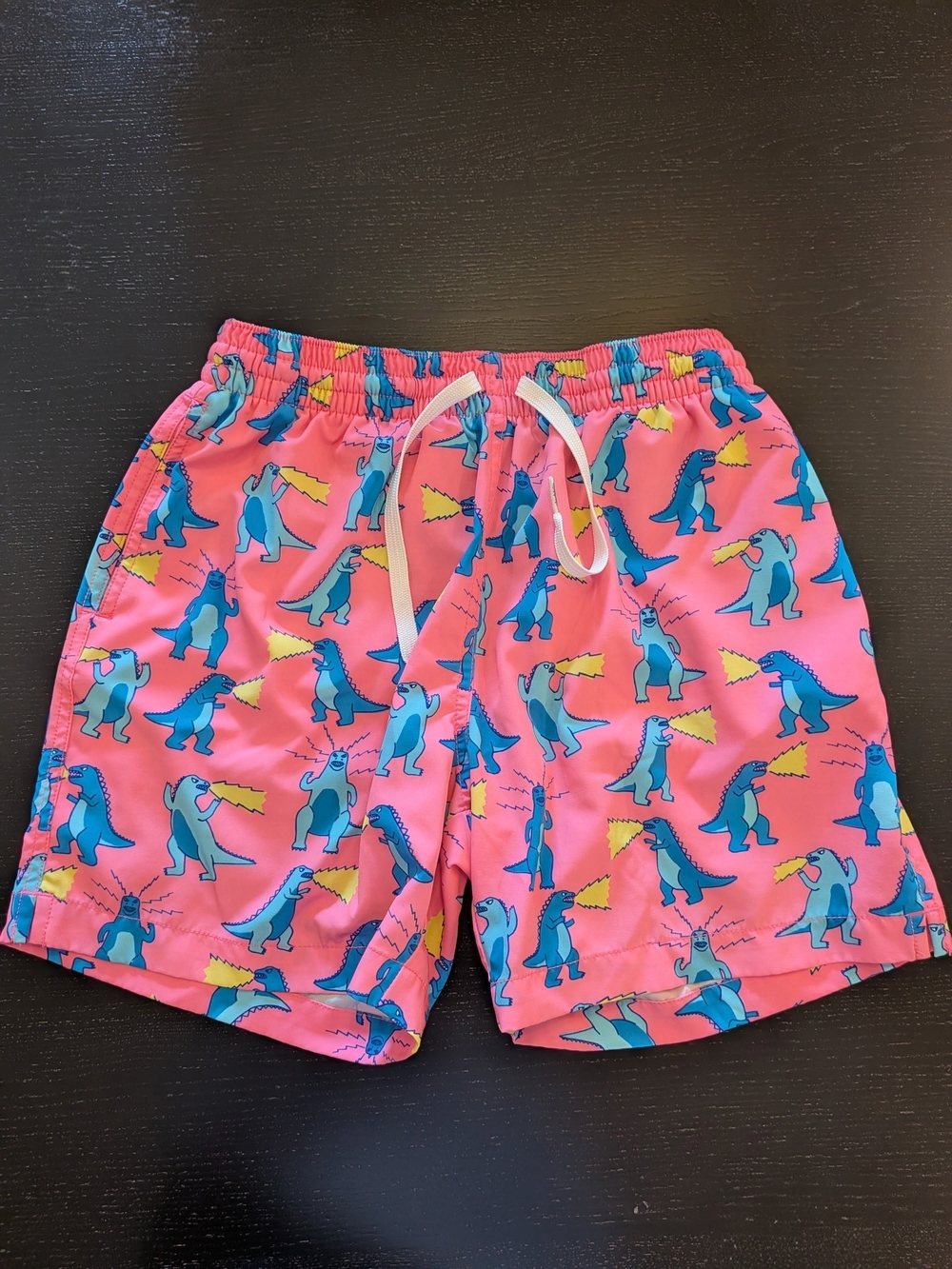 chubbies Pink Swim Trunks with Blue Dinosaur Motif